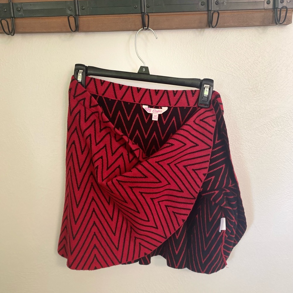 Candie’s red skirt with black design